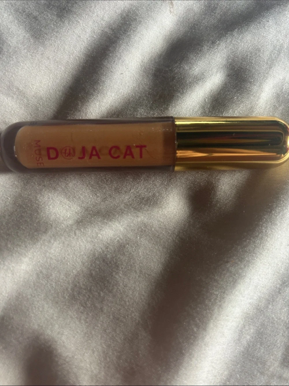 Doja Cat Gold Plumping Lip Gloss from BH Cosmetics